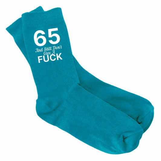 Funny 65th birthday socks for women with the phrase "65 And Still Don’t Give A Fuck".
Cosy and cheeky socks, size 4-7, perfect for milestone birthdays.
