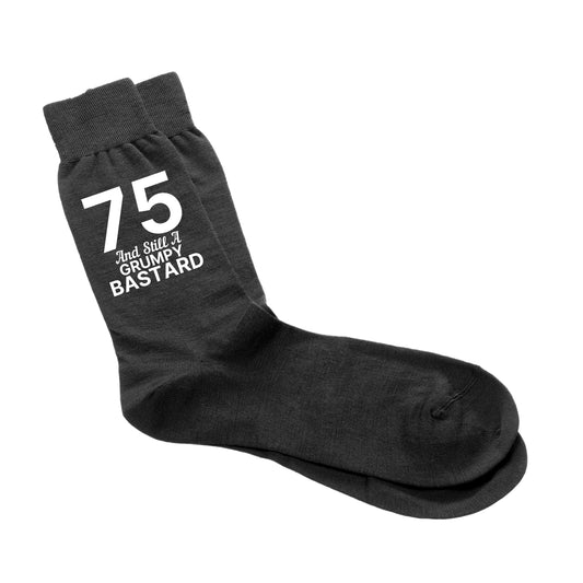 Funny 75th birthday socks for men with the phrase ‘75 And Still A Grumpy Bastard.’”
Cheeky milestone birthday socks, size 6-12, perfect for a 75th birthday gift.
