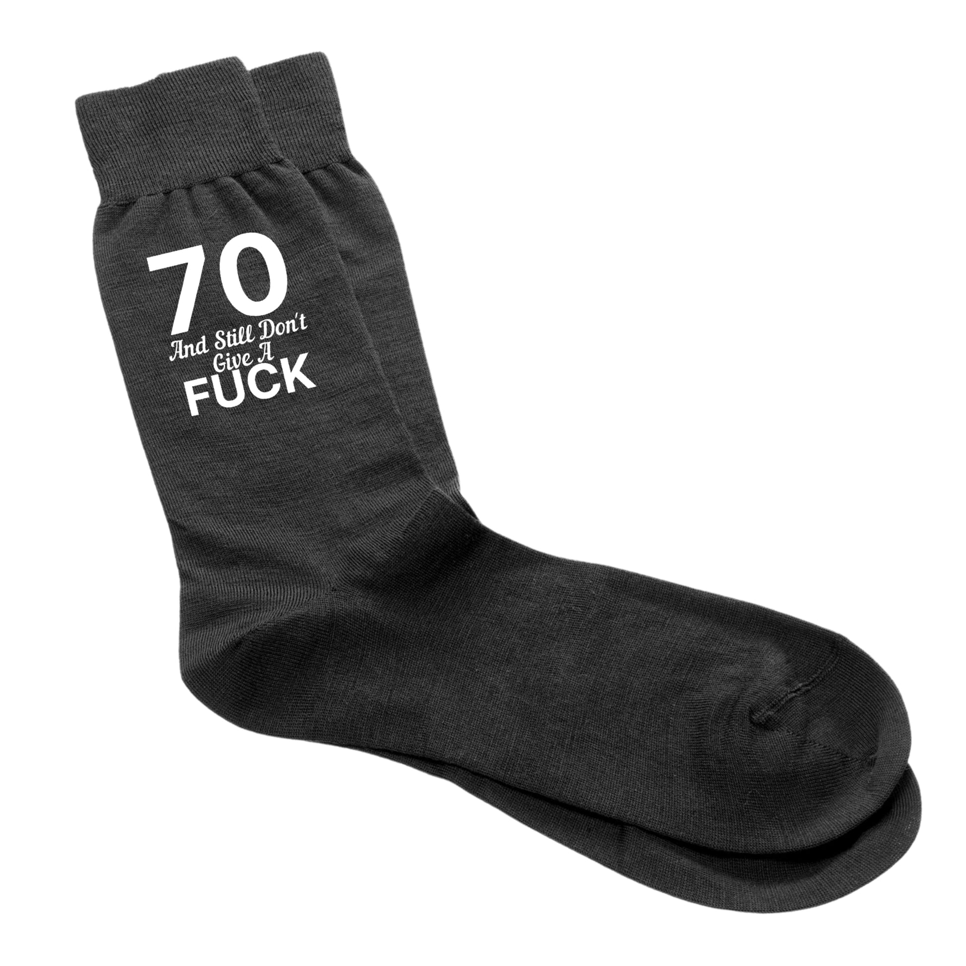 Funny 70th birthday socks for men with the phrase "70 And Still Don’t Give A Fuck".
Cosy and cheeky socks, size 6-12, perfect for milestone birthdays.
